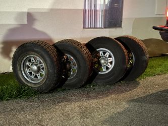 Set of 4 - 16” Truck rims With 33” And 35” AT Tires