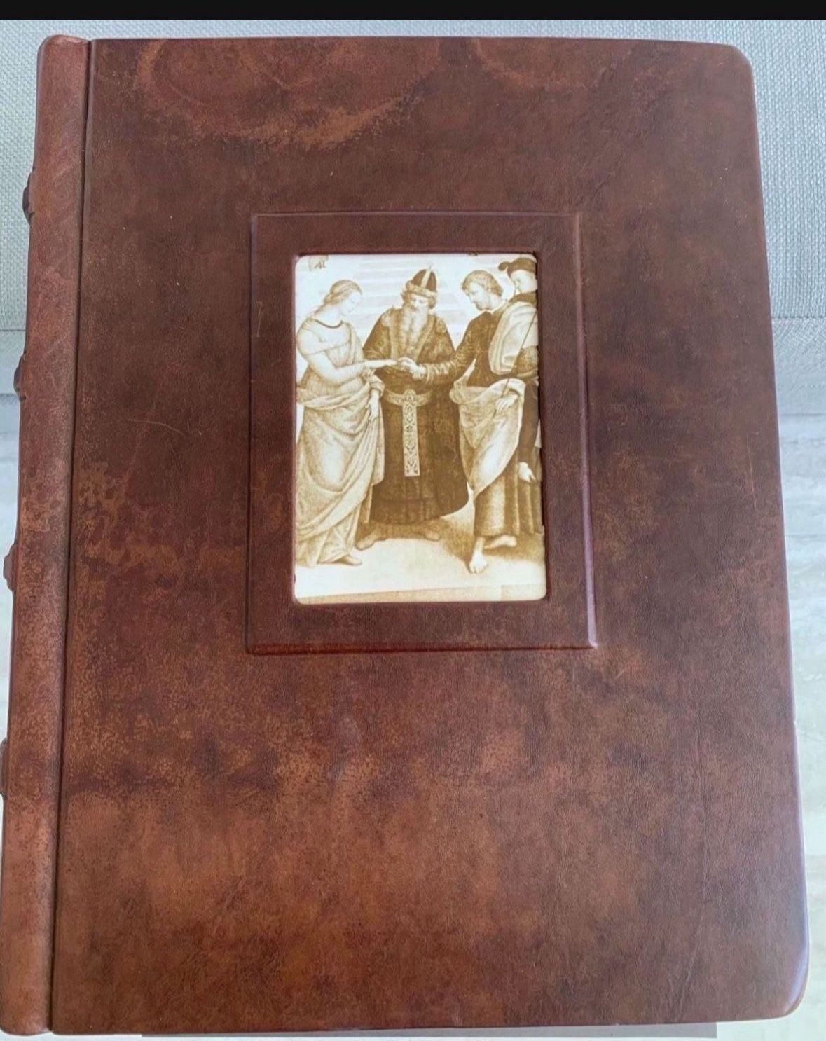 So Unique! Brown, leather LARGE bound 50 page scrapbook. Each page has a paper protective covering for items for the book. Never used Great condition.