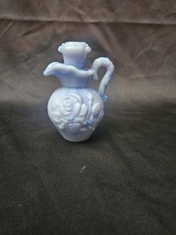 Avon petite blue rose pitcher.