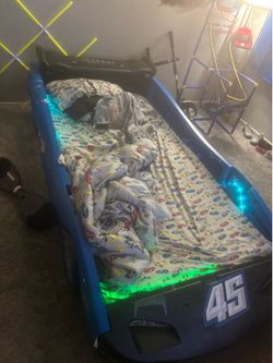Blue Kids race car bed