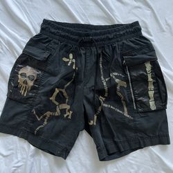 Vintage faded, black cargo shorts, Nike size large skulls