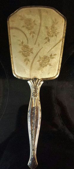 Vintage hand held mirror