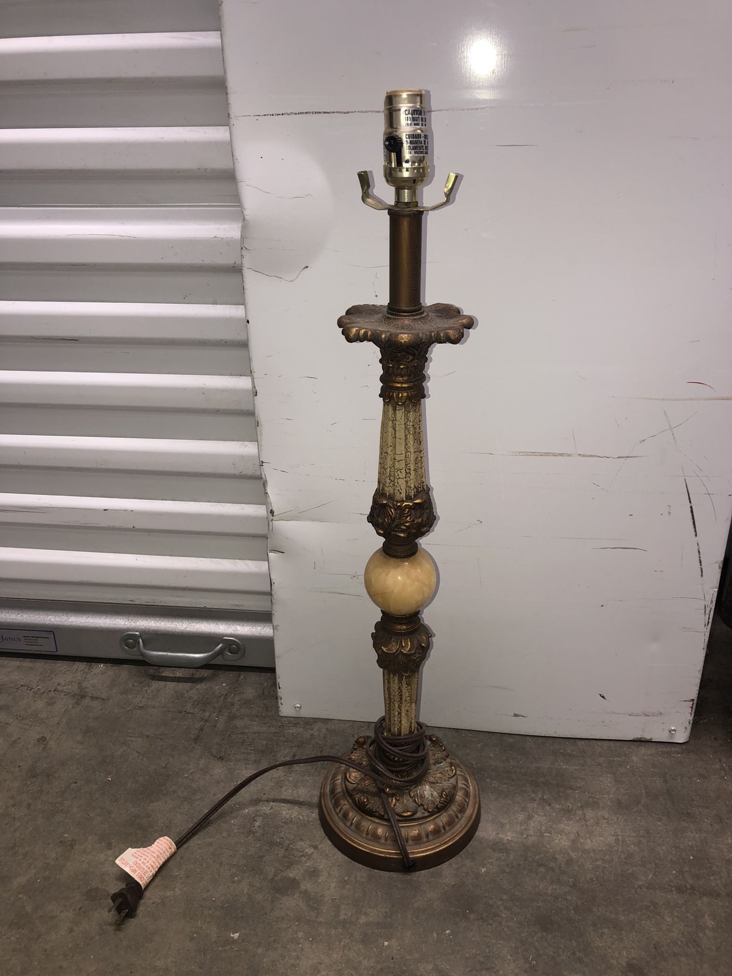 Light Antique Bronze Looking Like Metal With Large Pearl Looking Ball In The Middle ones