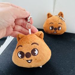 Two Brown Keychain Pluses Together