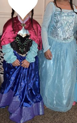 Elsa and Anna dresses sizes 12 in Elsa and 10 in Anna Walt Disney brand only worn once