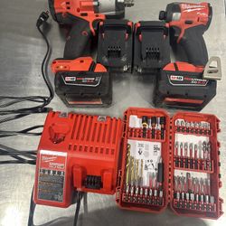 1/2 in Impact Wrench and Impact Driver. 4 batteries, charger, and but set tools box.