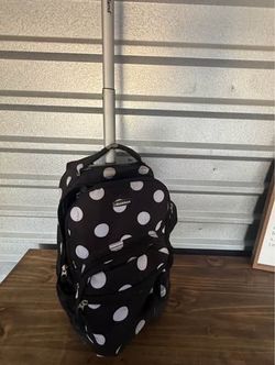 Rockland. Rolling backpack with wheels and telescoping handle
