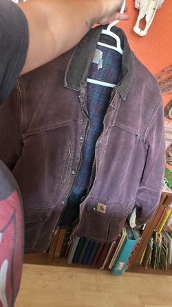 Vintage Carhartt C10 blanket-lined jacket in a dark burgundy