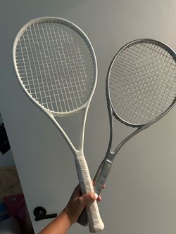Two Tennis Rackets White and Silver