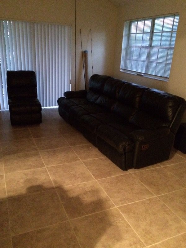 Leather couch with recliner on two sides