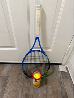 Tennis racket and tennis balls