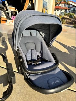 Nuna + next rider double stroller