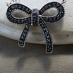 Blue diamond ribbon on sterling silver necklace