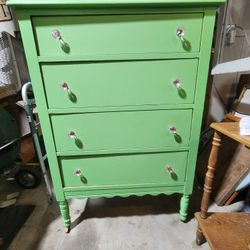 Darling Antique Bright and Happy Wood Dresser with pink knobs. Wood wheels 