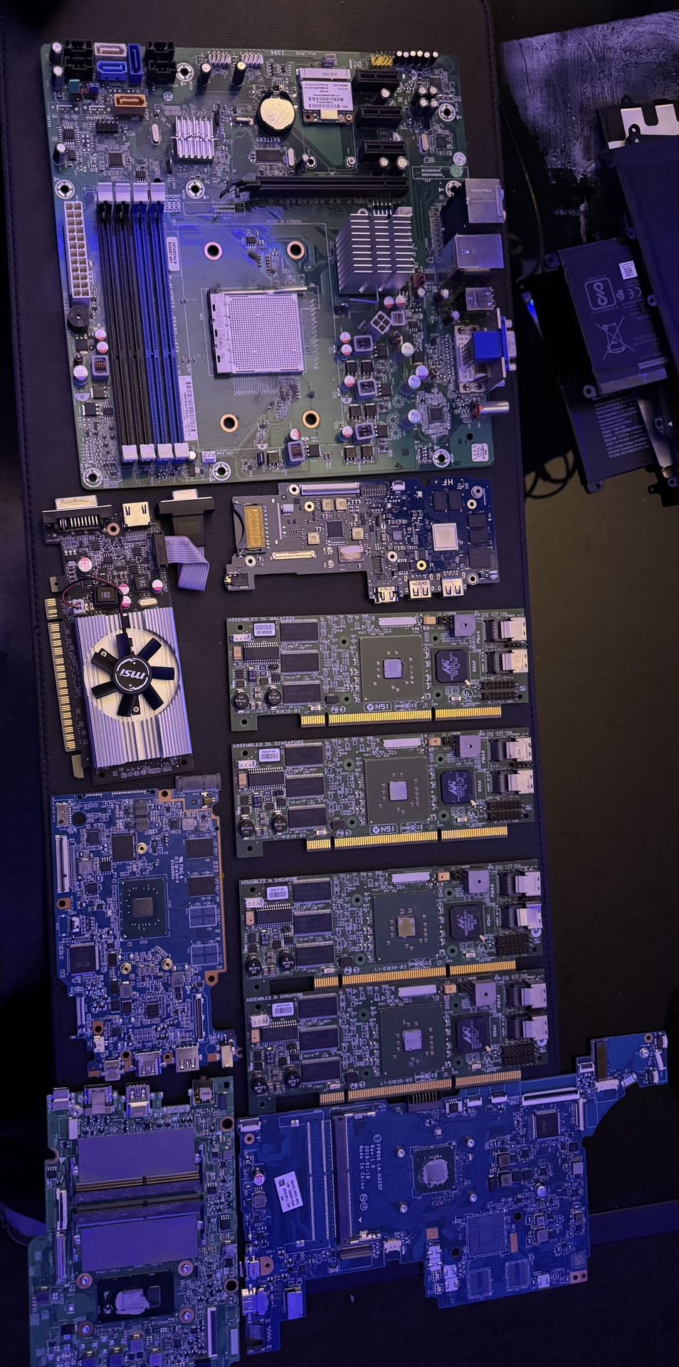 Assorted computer components (motherboards, batteries, graphics card, etc)