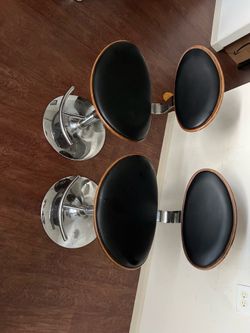 2 Brown adjustable barstools