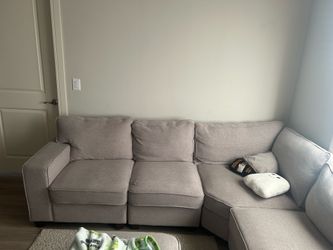 Light grey sectional 6 piece with ottoman