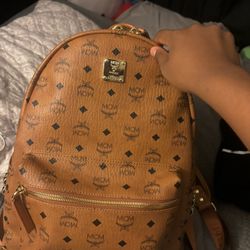 brown mcm backpack