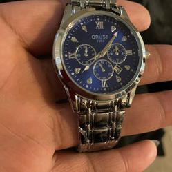 Men’s Blue And Silver Watch