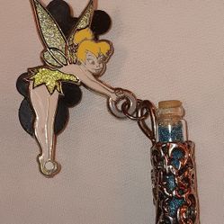 Disney Tinkerbell pin with glass bottle of pixie dust PRICE IS FIRM 