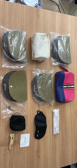 ⁠Set of 6 STARLUX Airlines Pouches & Estée Lauder Travel Bags
