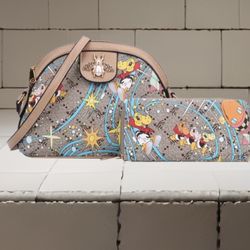 Tan dinosaur cross body