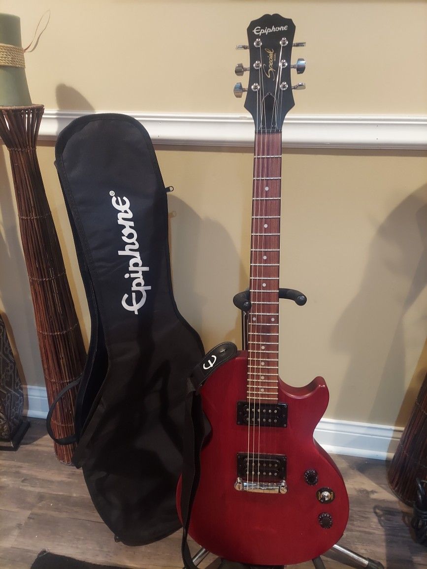 Epiphone special les paul electric guitar with stand, gigbag and strap