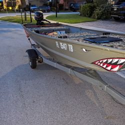 12ft Wide Jon Boat with A 9.9hp Trailer And Title 