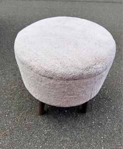 Fluffy decor chair with storage for blankets