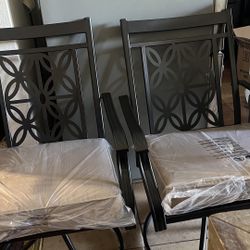Two Out Door Swivel Chairs 