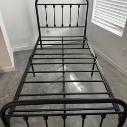 Two Identical Iron Twin Bed Frames 