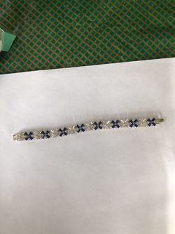 Bracelet: Sapphire and diamond.