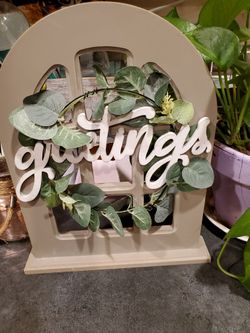 12$ Greetings Sign.