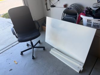 Black Mesh Office Chair with Wheels and table