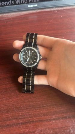Bulova Watch black band with real Diamonds behind the crystal watch face and crystals around the dial