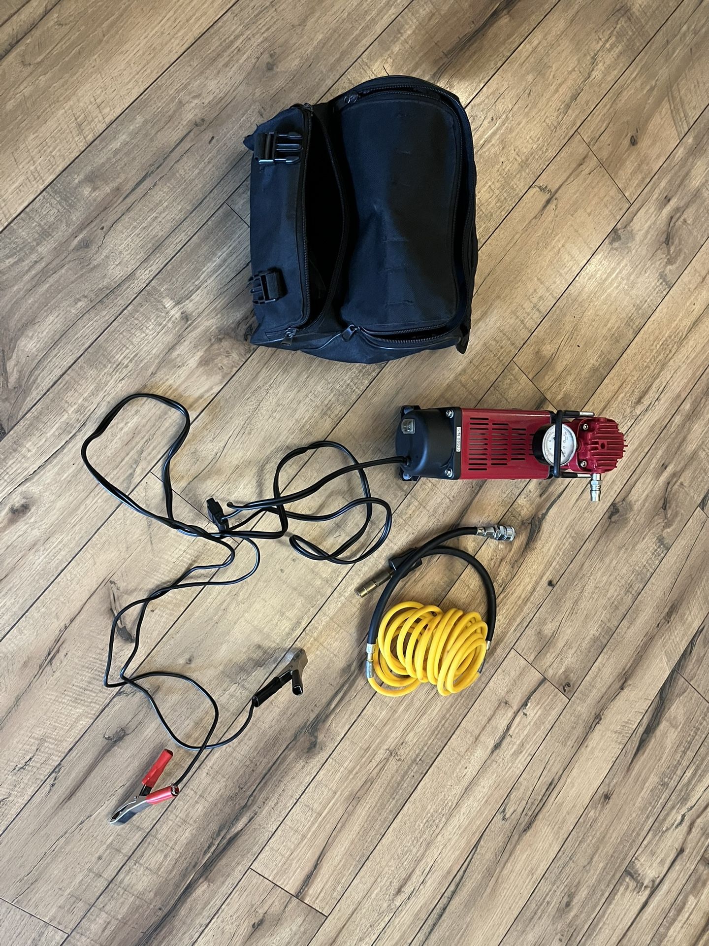 FREE 12V air compressor with hose and carry bag