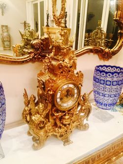 Antique brass clock set with pair of candelabras. Large