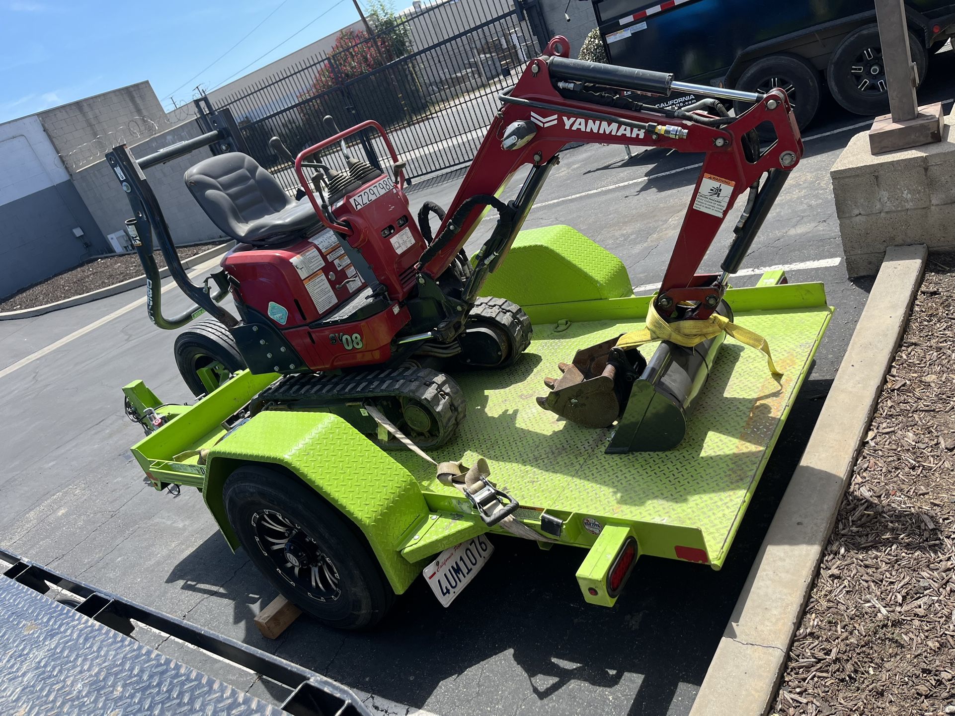 Yanmar Sv08 on diamond C 7k single axle custom tilt trailer