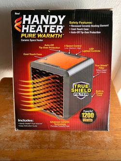 BRAND NEW HANDY HEATER SEALED IN BOX 