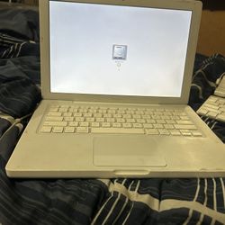 White Old MacBook 