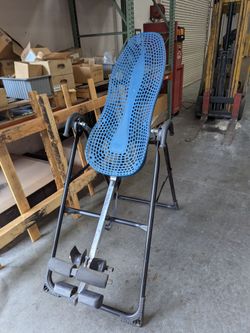 Inversion table teeter hang ups