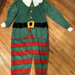 Elf onesie size small/medium. Has a few small Holes in back that can easily be sewn. 