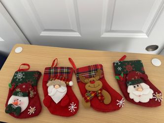 4 small Christmas stockings for gifts, all for $5!