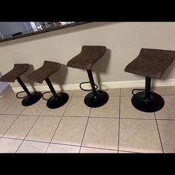 4 Brown Adjustable Bar Stools