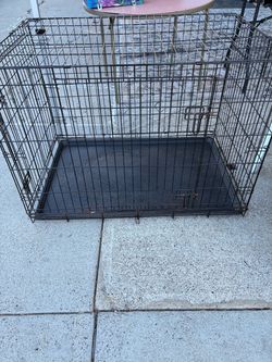 BEAUTIFUL PET CAGE 2 DOORS 42 INCHES WIDE X 27 1/2 INCHES DEEP AND 30 INCHES TALL