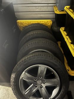 Honda Stocked Rims w/ Very New Like Tires