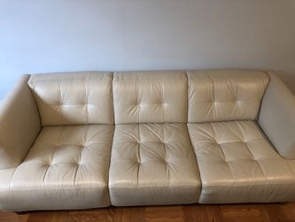 Macy’s white leather couch