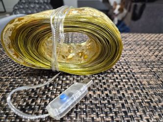 Christmas Decor Bundle – Gold Lighted Ribbon (USB) & Nativity Wooden Ornament
