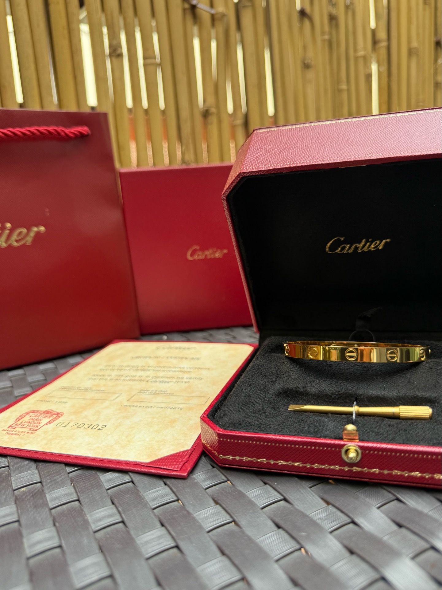 Gold Cartier love bracelet