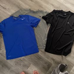2 Nike dri-fit  And 1 Adidas Climalite Medium. 3 Shirts Total. 